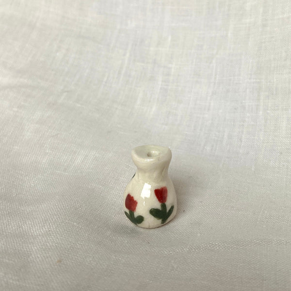 tiny vase with red tulips 2